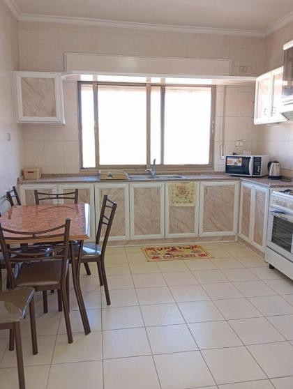 Furnished Family Apartment in Dahyet Al-Rasheed with Free Parking - image 21