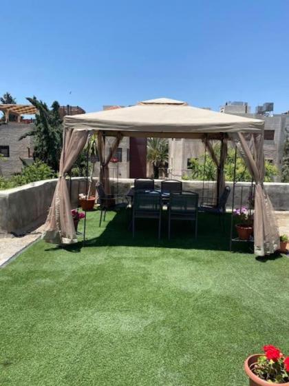 sunny 2bedroom apartment in weibdeh with a rooftop - image 21